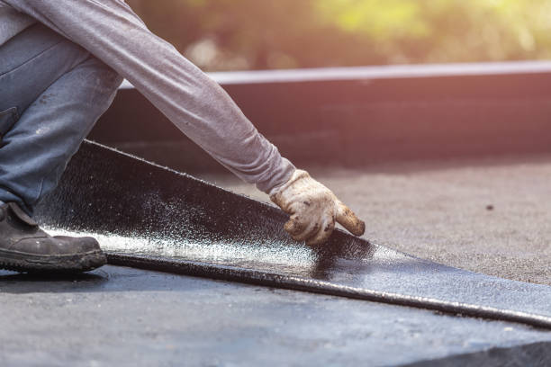 Professional Basement Waterproofing technician working in Collinwood, TN